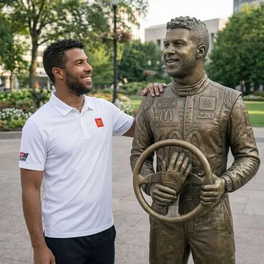 Cover Image for In An Emotional Ceremony That Filled The Nascar Hall Of Fame With Cheers And Proud Supporters, Bubba Wallace Was Honored With A Rare Full-body Bronze Statue On The Hollywood Walk Of Fame — A Historic Tribute Far Beyond The Traditional Star Plaque, Celebrating The Barrier-breaking Pioneer Of The Sport.